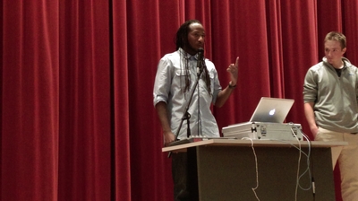 Senior Mac Whaley watches on as hip-hop artist Toki Wright enlightens students on the power of music
