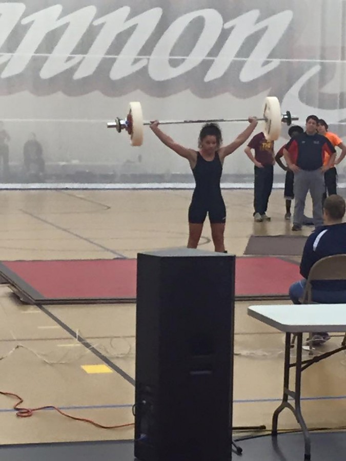 Senior Beth Parlin lifts 35 kilograms in the snatch at Saturdays Southern Minnesota High School Open. 