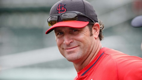 St. Louis Cardinals manager Mike Matheny (22) watches his team take batting practice before the game between the Boston Red Sox and the Cardinals at JetBlue Park.