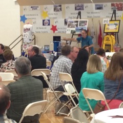 John Kohner auctions off a bundle of Twins tickets at the 37th Cotter Auction on April 16, 2016