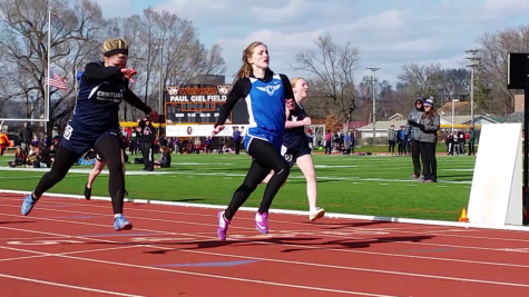 Sophomore Claire Nichols races in the finals of the 100m dash.