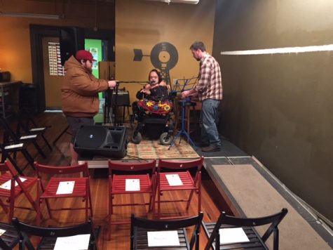 Gaelynn Lea setting up at MidWest Music store