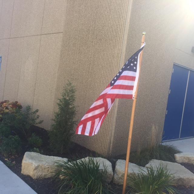Old Glory flies at new voting station