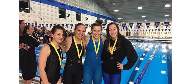 Mary Hoffman, Lauren Whyte, Emily Boettger and Alexa Lofgren, the 4x100 team