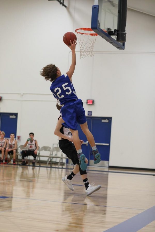 Rob Besek converts a steal into points vs L-A  (photo by Judd Stanislawski)