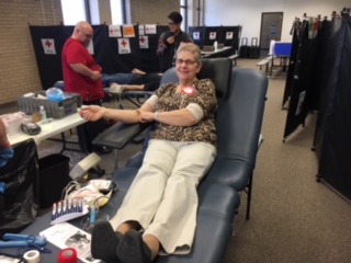 Mrs. Deb Lisowski donates at the blood drive