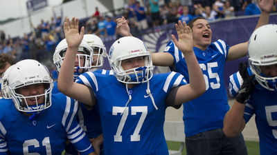 Brian Menke celebrates Cotters opening game victory over Medford