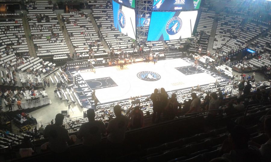 New-look Timberwolves win home opener