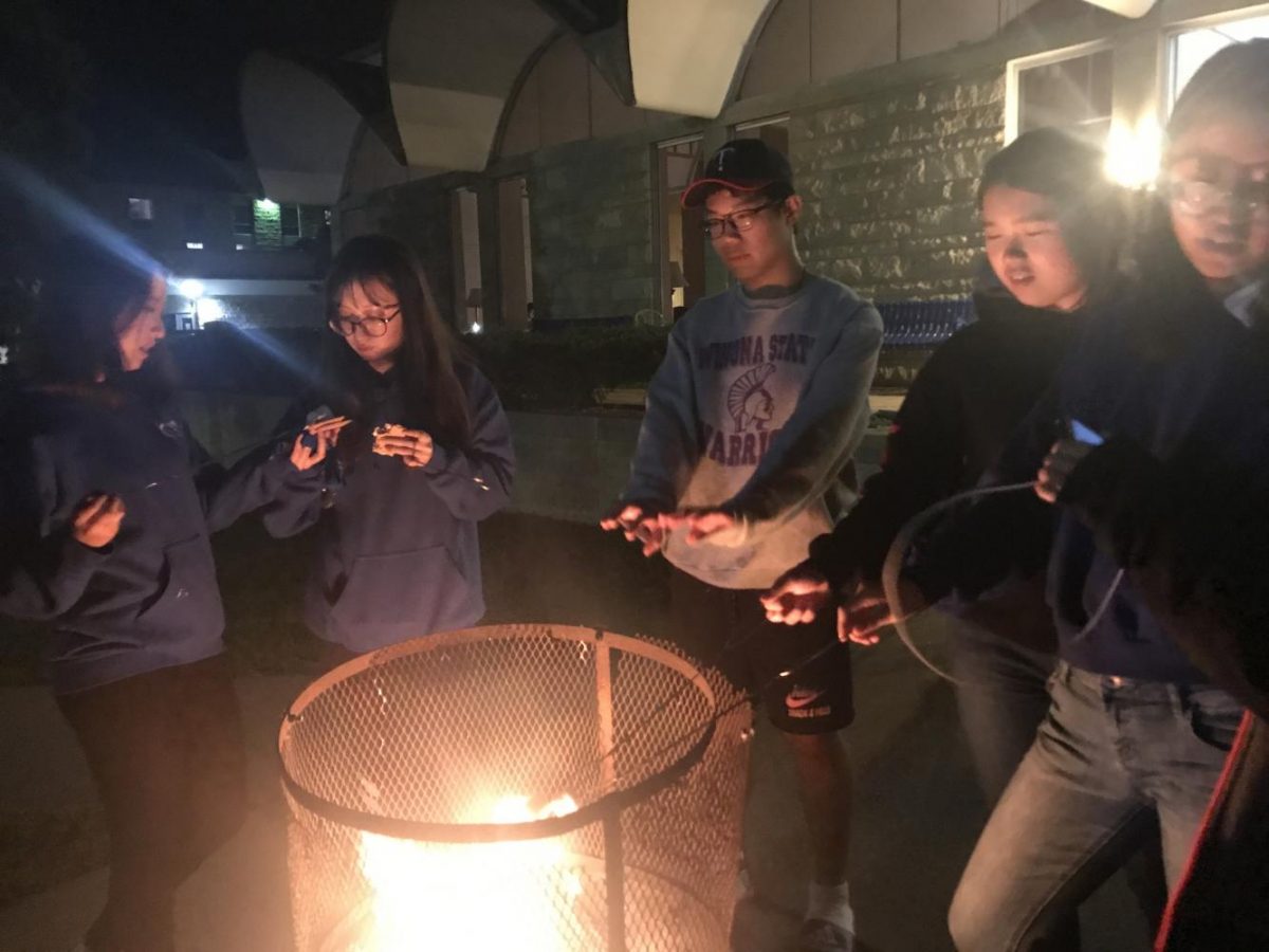 Holly Yi, Chaelim Kim, Martin Kim, Fay Li and Lexi Li at the dorm bonfire