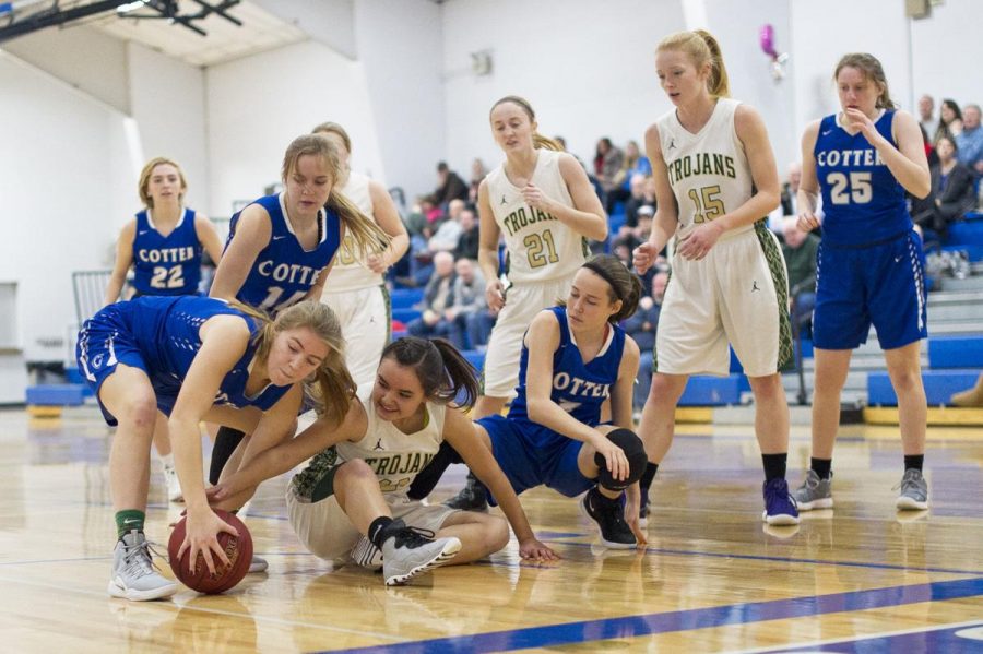 Olivia Gardner battles for a loose ball vs R-P.  photo by Chuck Miller, Winona Daily News