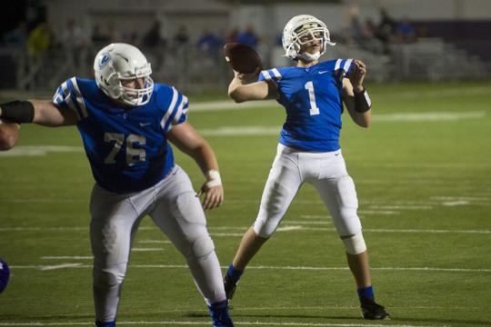 Freshman Tate Gilbertson winds up to throw the ball in a game this past fall. Chuck Miller, Winona Daily News