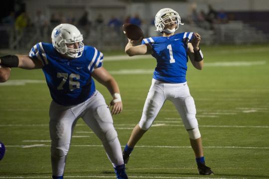  Freshman Tate Gilbertson winds up to throw the ball in a game this past fall. Chuck Miller, Winona Daily News