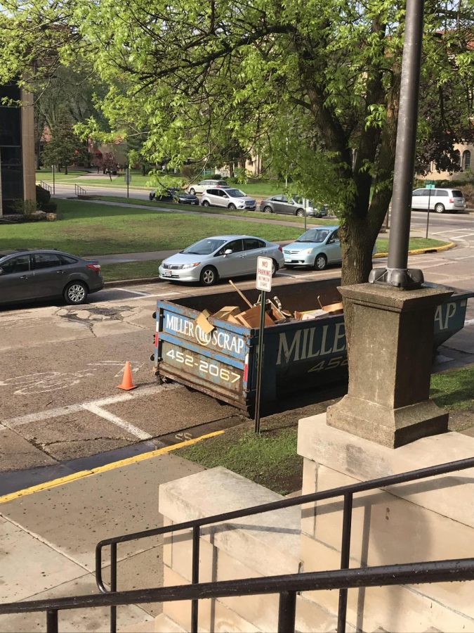 Dumpster outside the high school. Teachers making room for everyone in one building.