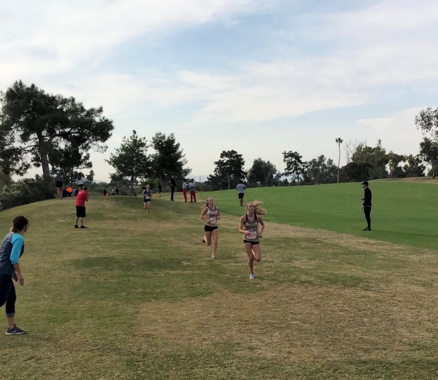 Lauren leads Grace during the 2019 Arizona AIA State Cross Country Championships