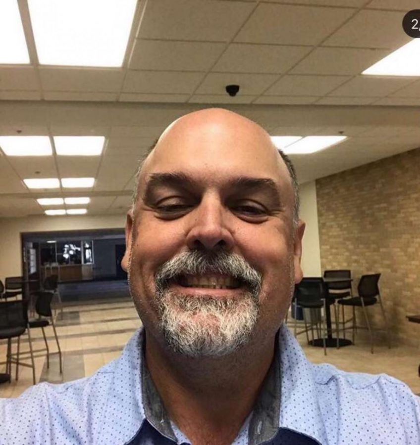 Mr. McGlaun, poses for a selfie for the Cotter girls soccer team's Instagram.