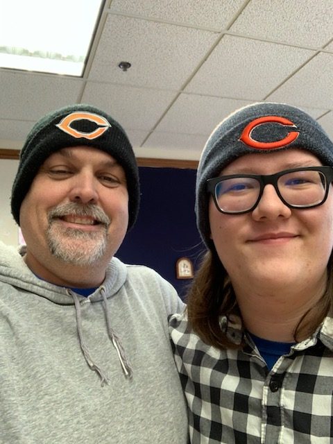 Mr. McGlaun and Sal Piscitiello sport Chicago Bears hats for theme day.