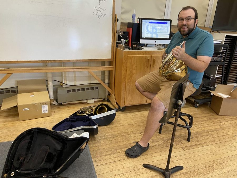 Mr. Meurer cleaning crap in the band room early in the school year