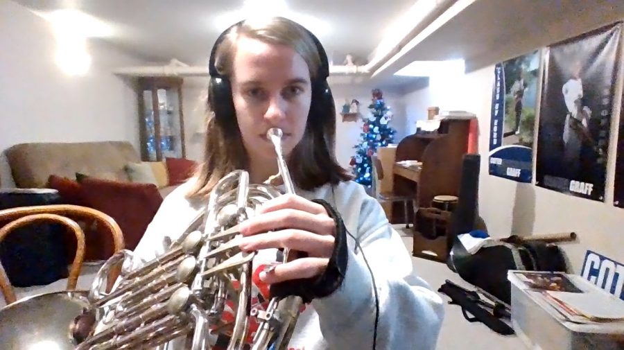 Hannah Graff practices French horn at home