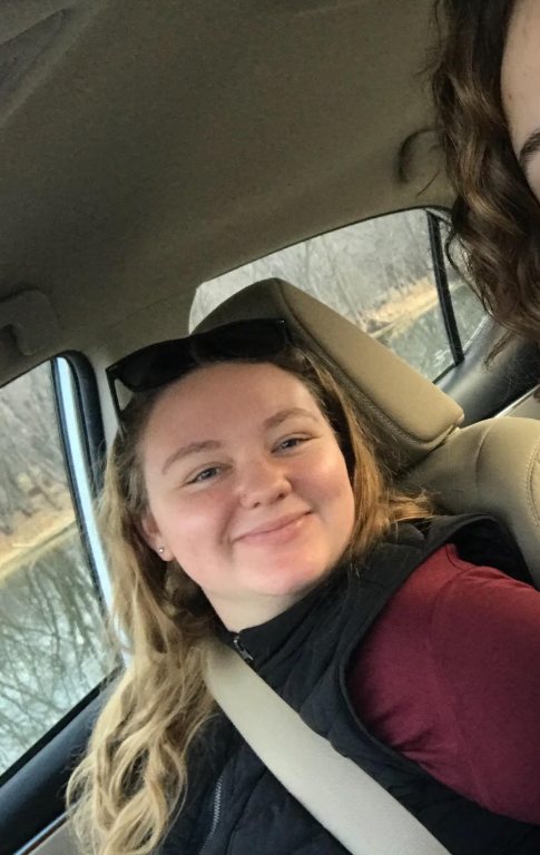 Abby Allred smiles on her way to a baby sitting job