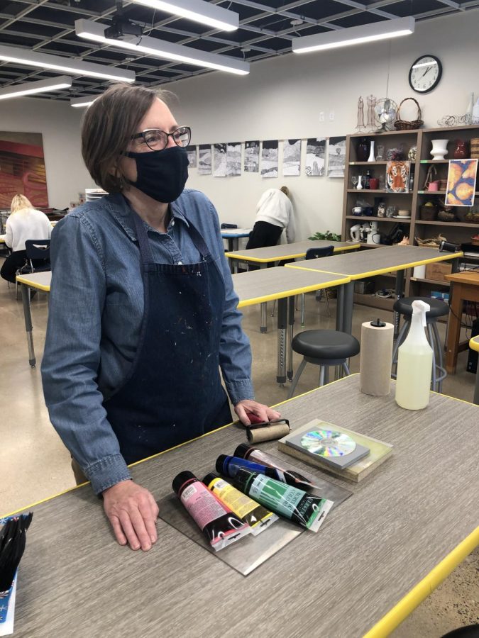 Mrs. Forney prepares for high school students to return to in-person art classes in John Netts newly renovated art room.