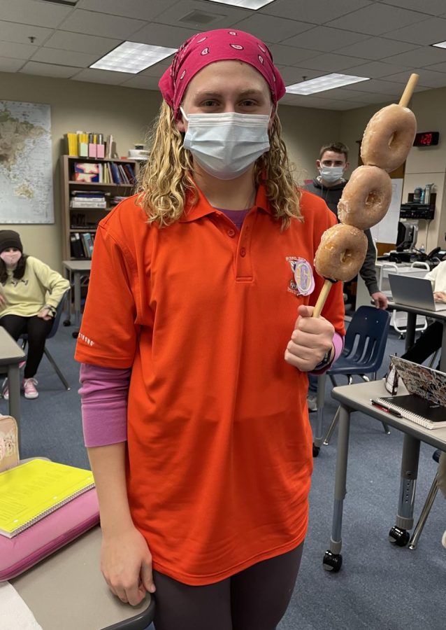 T-Bo shows up for AP Lit class, with,of course, donuts on a stick
