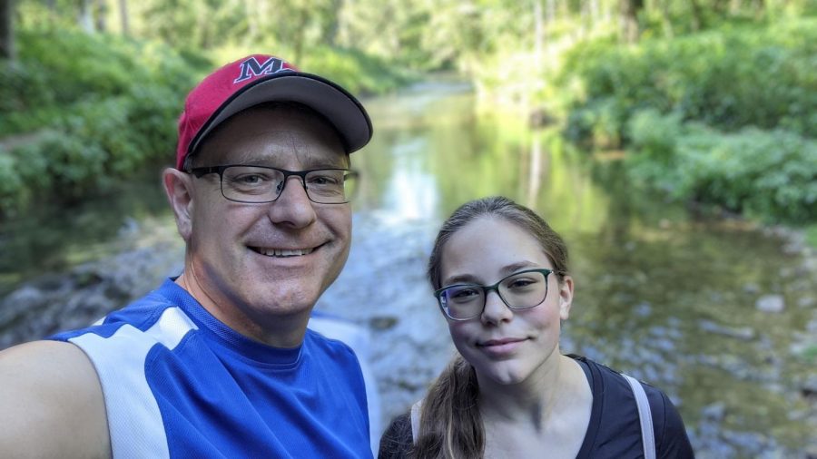 Father+and+daughter+out+enjoying+nature.