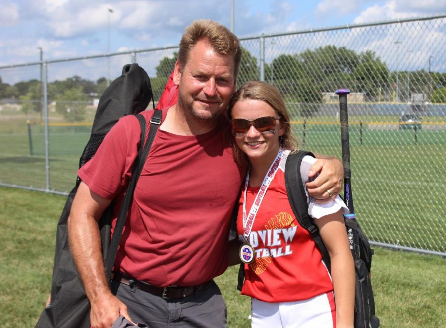 Shawn and Maddie Kohner share a moment together after a summer softball tournament.