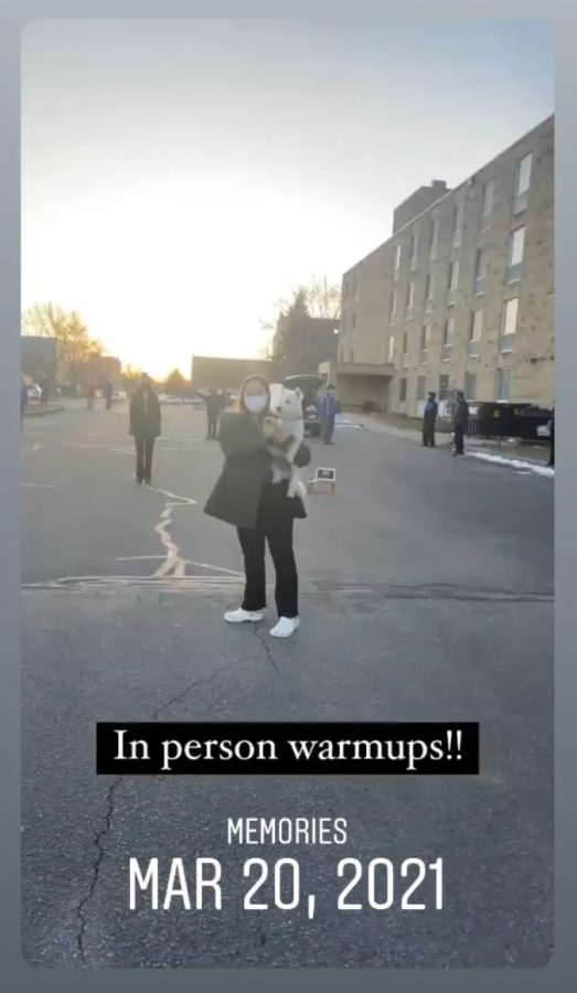 Allie French warms up in the parking lot outside the Cotter Residence Center in prepping for a speech meet. 