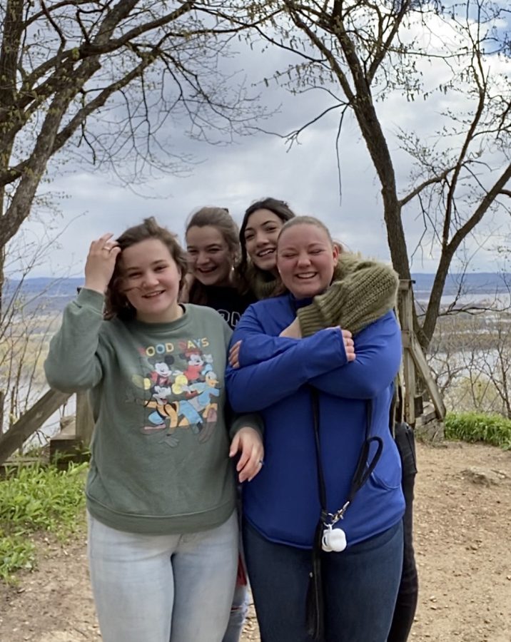 Juniors Suzanne Duellman, Abby Briggs, Grace Menke, and Abby Allred (left to right) spend quality time high in the bluffs of Winona County.