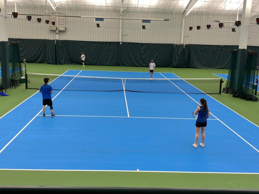 Tennis match at Cotter on April 9th. Edward Zhang and Ema Staňková from left.