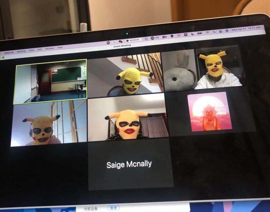 A group of Cotter students wear their Pikachu masks to a Zoom English class to connect with the in person learners and bring a smile to their day