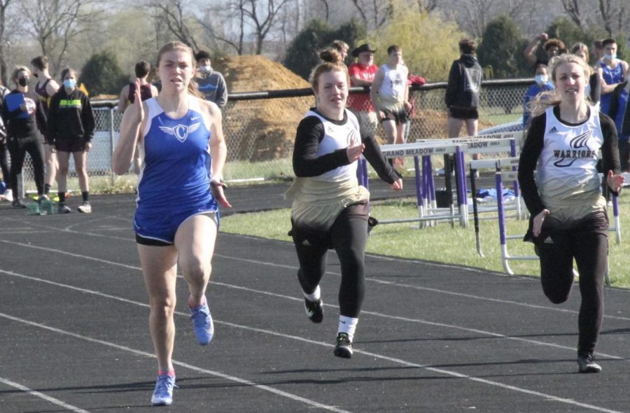 Olivia Gardner runs the 100 meter dash.  Gardner set a school record with a time of 12.72