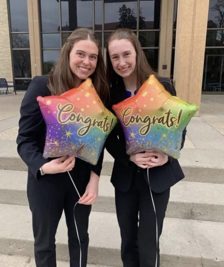 Grace Miller and Aubrey Williams, Cotters two State speech champions, celebrate making finals, prior to earning their ultimate titles.