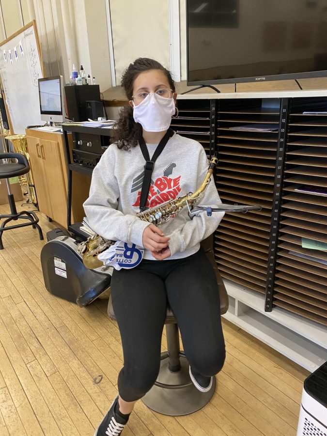 Alessia sits in the band room before marching band Wednesday evening.