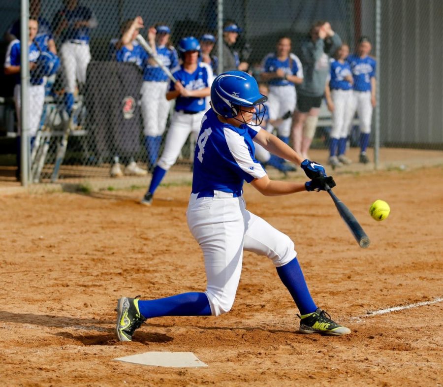 Ellie Macal swings at a pitch in Cotter's 2019 game vs Lewiston Altura