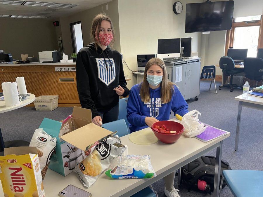 Sera Speltz (left)and Olivia Gardner (right) enjoy Fondue Friday in study hall