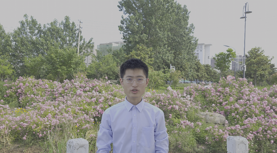 The reporter in a park near his home autorecording a petition for the graduation ceremony