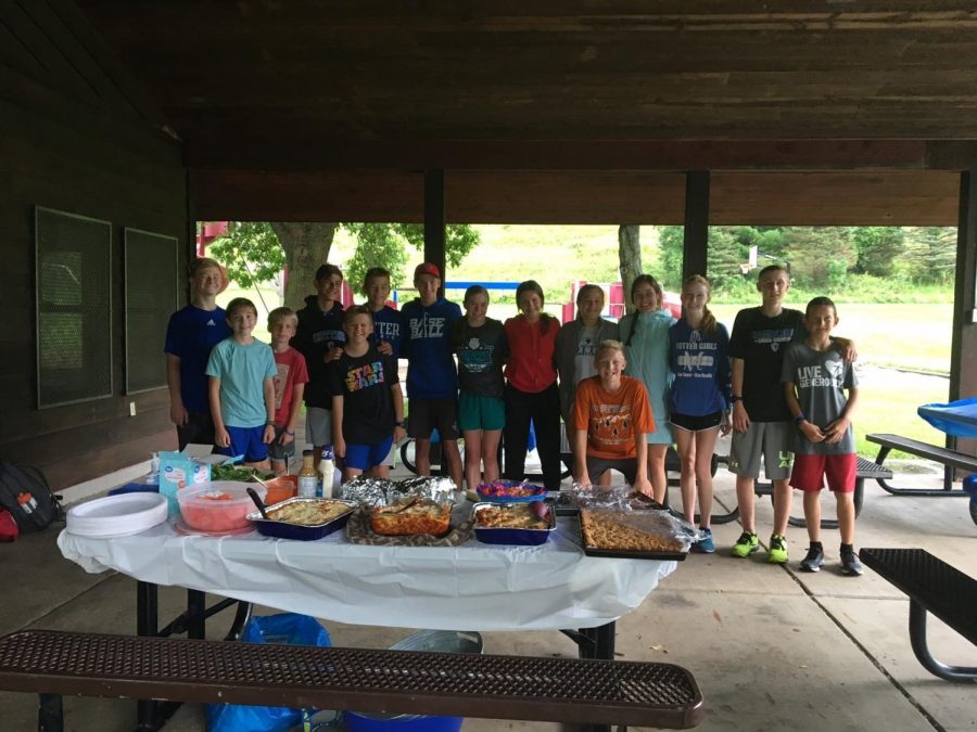 Cross Country members enjoy a team dinner at the Valley Oaks Park Pavilion.