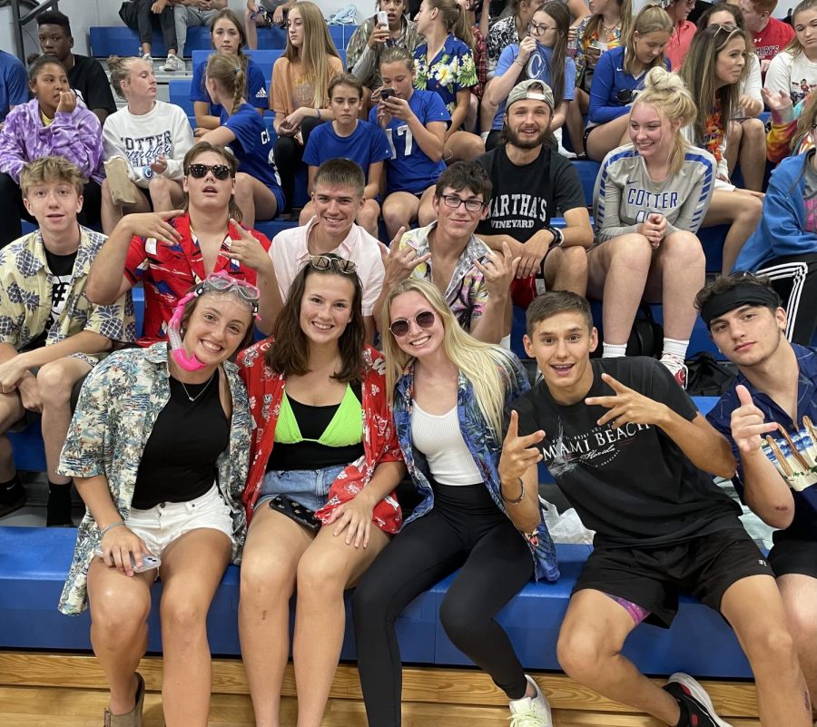 The Cotter student section, the 6th man megacorps, enjoy themselves at the home opener volleyball match