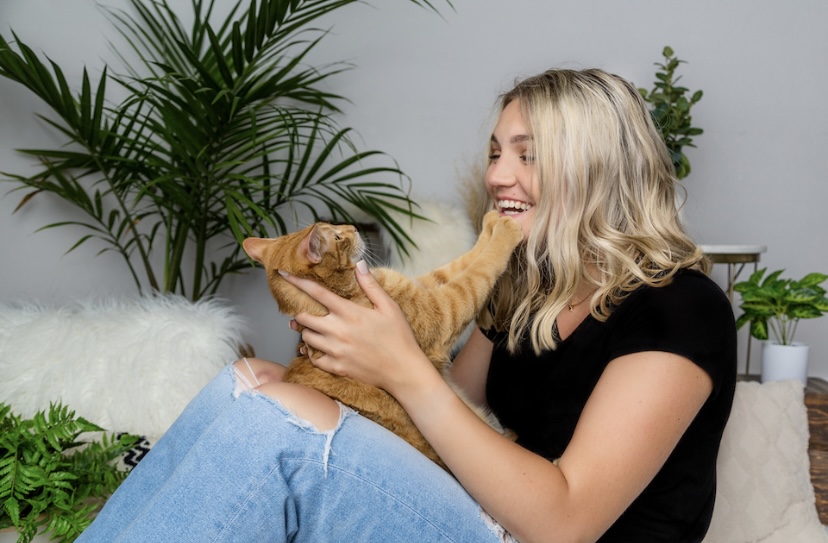 Chubs posed with her Olivia for senior picture, or was it his?