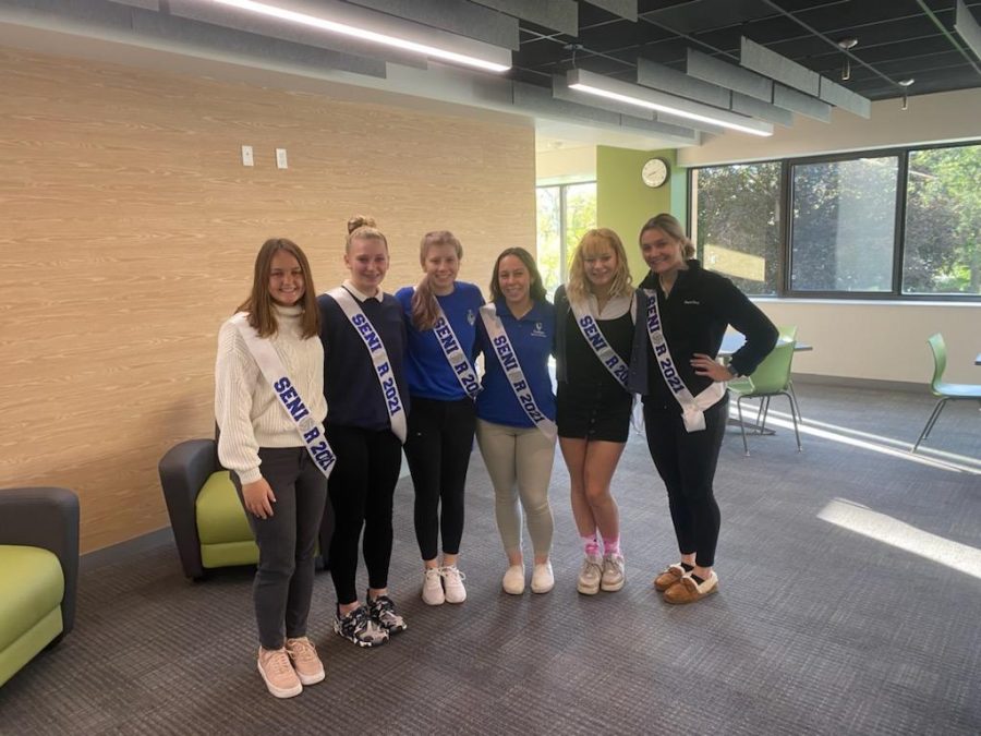 Andie+T%2C+Rachel+M%2C+Lexi+D%2C+Ali+F%2C+Madison+R%2C+Olivia+B.+sporting+their+sashes+on+senior+night+for+volleyball.