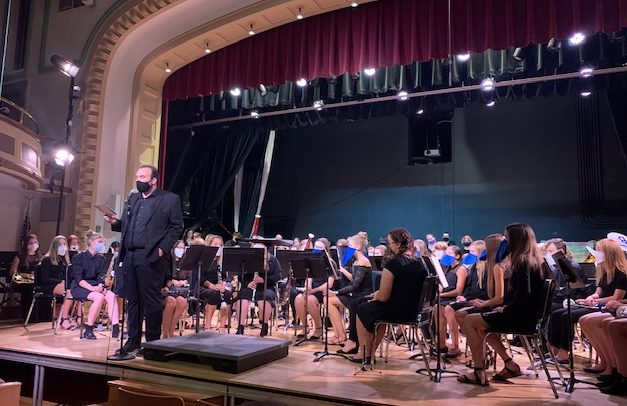 Mr. meurer addresses the audience at the band concert