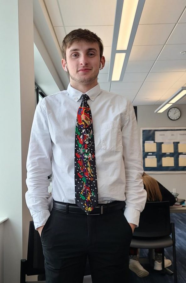 Senior guard Charley Schroeder in shirt and tie on game day