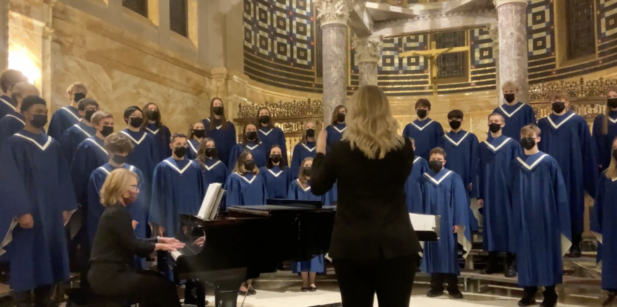 Mrs. Jirele conducting the Cotter Choir during the Christmas concert