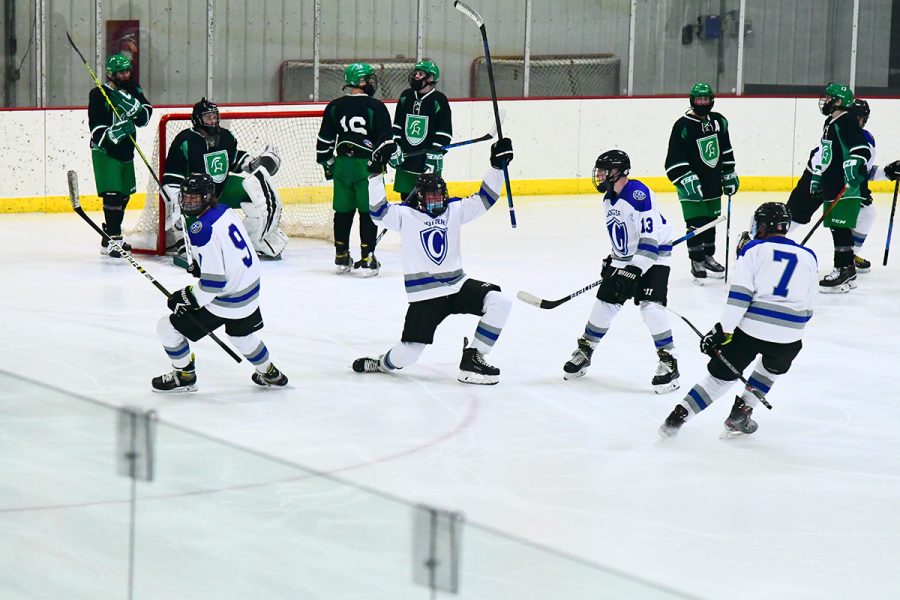 Wes Kohner and teammates celebrate after he scored a goal at a home game