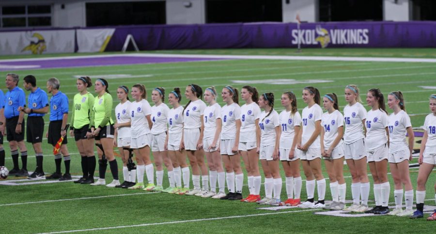 The Cotter soccer team is announced prior to the State semifinal at US Bank stadium in November, 2021