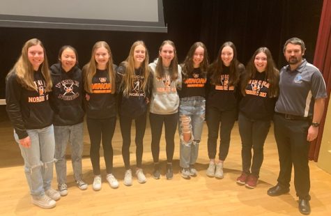 Members of the Winona High/Cotter Nordic ski team are recognized at a Cotter assembly