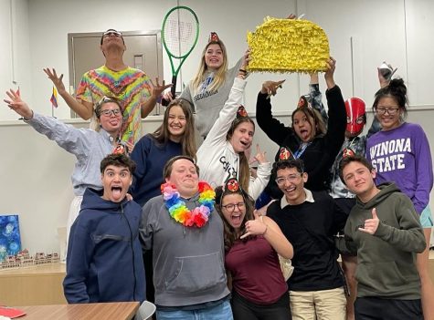 The international students with Trevor Young at his surprise party