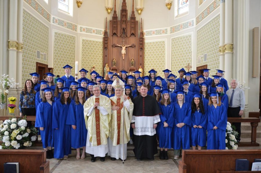The Cotter class of 2022 with Bishop Quinn and Fr. McNea at St. Augustine's in Austin, Minn.