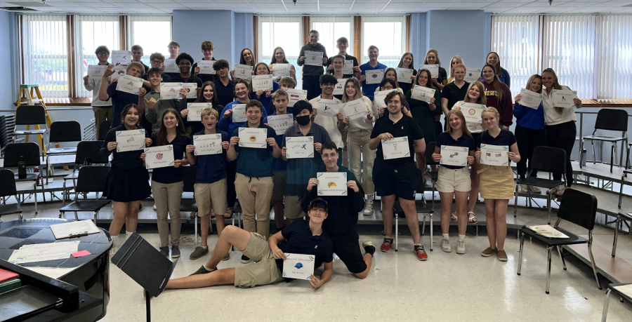 The Cotter Choir holds up their 2022 Choir Awards!